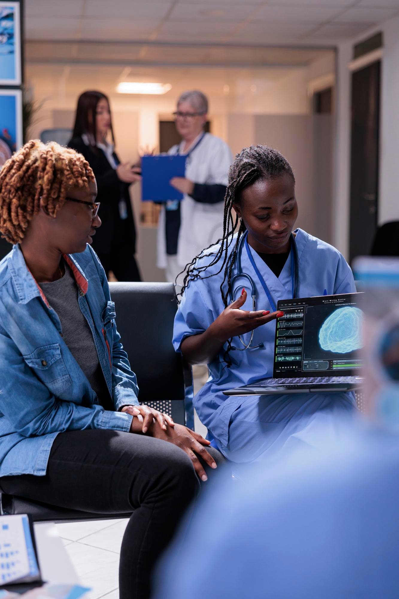 nurse-patient-analyzing-brain-scan-laptop-talking-about-tomography-diagnosis-neural-system-computer-young-woman-medical-assistant-doing-checkup-consultation-waiting-room-lobby